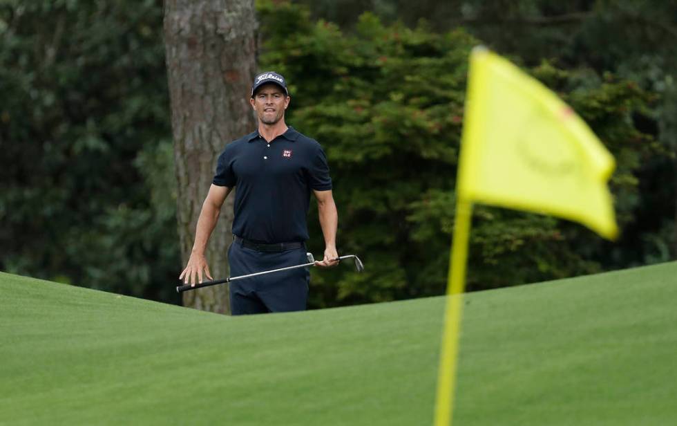 Adam Scott, of Australia, looks over a shot on the eighth hole during the final round for the M ...