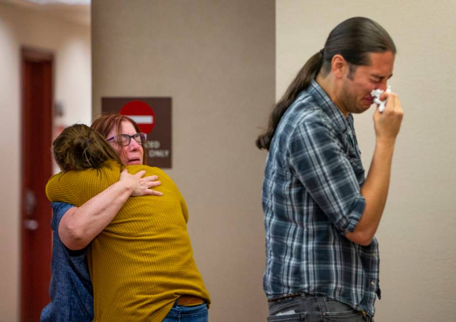 Family members and supporters comfort each other after former Metro officer Pamela Bordeaux, ch ...