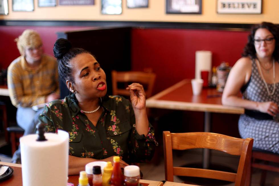 Sheila Collins asks a question of democratic presidential candidate Andrew Yang at a town hall ...