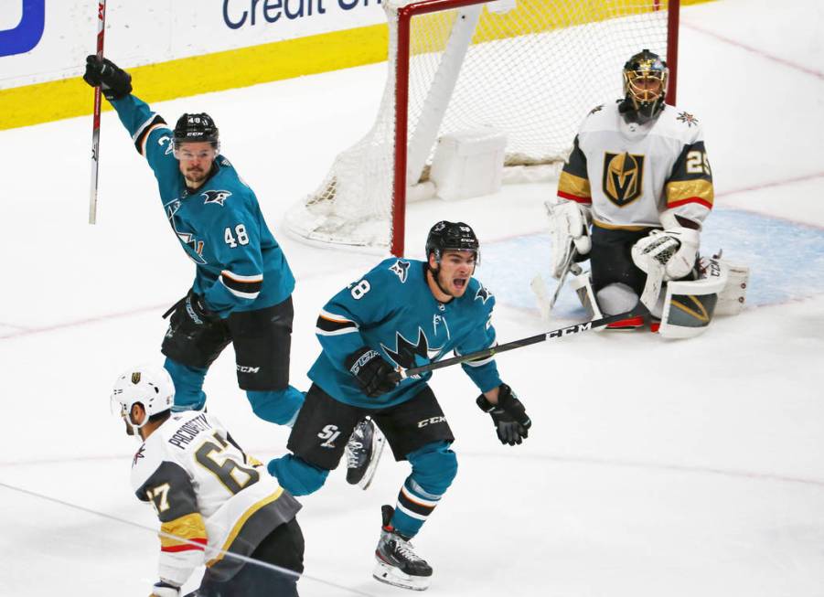 Sharks center Tomas Hertl (48) and Sharks right wing Timo Meier (28) celebrate after the Sharks ...