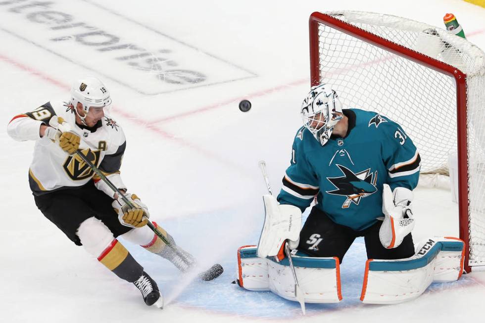 San Jose Sharks goaltender Martin Jones (31) makes a save against Knights right wing Reilly Smi ...