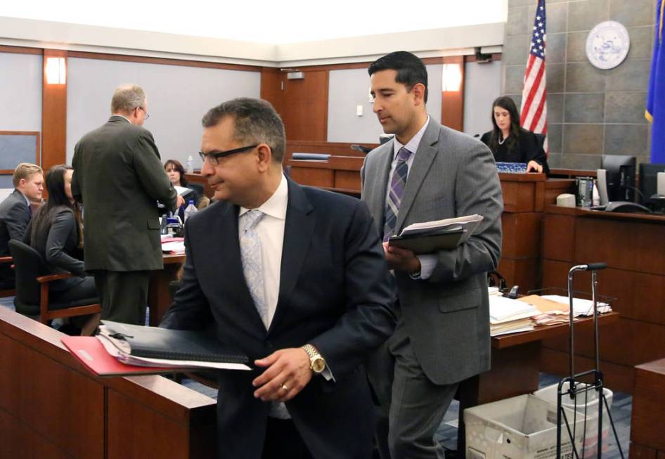 Defense attorney Chris Oram, left, who represents former LVCVA executive Brig Lawson, and Chief ...