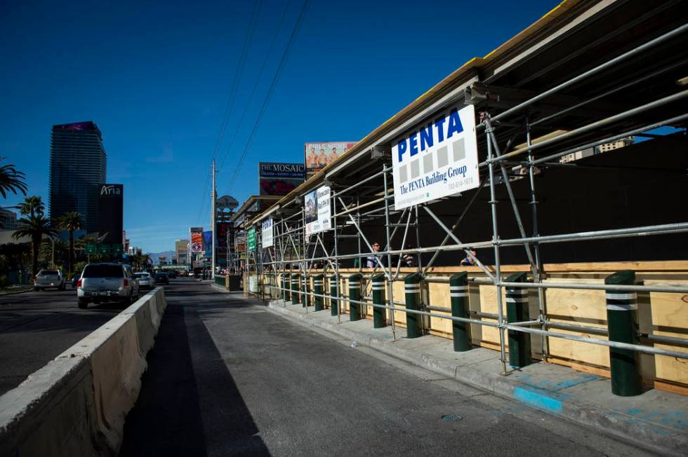 A vacant lot sits next to the Cable center shops on the Las Vegas Strip, Wednesday, April 17, 2 ...