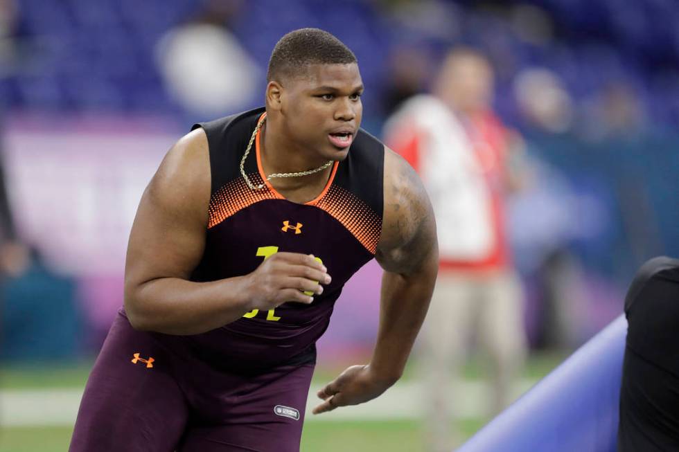 Alabama defensive lineman Quinnen Williams runs a drill during the NFL football scouting combin ...