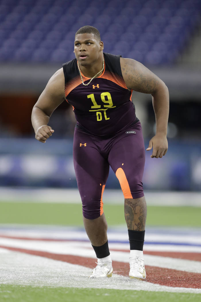 Alabama defensive lineman Quinnen Williams runs a drill during the NFL football scouting combin ...