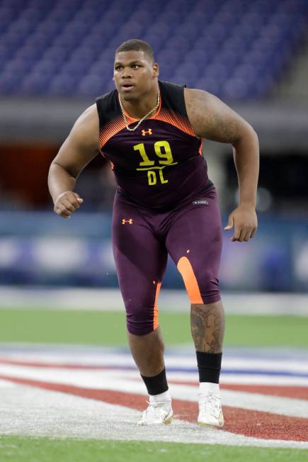 Alabama defensive lineman Quinnen Williams runs a drill during the NFL football scouting combin ...