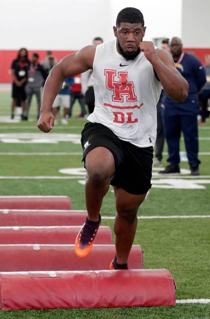 Houston defensive lineman Ed Oliver Jr. participates in drills during Pro Day at the indoor foo ...