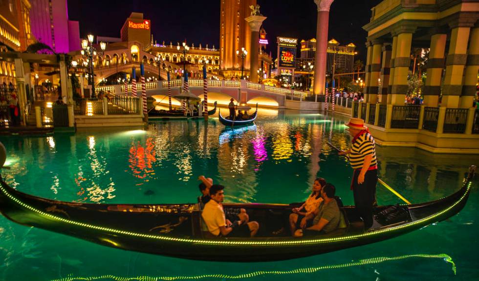 Tourists ride gondolas at The Venetian on Wednesday, April 24, 2019, in Las Vegas. (L.E. Baskow ...