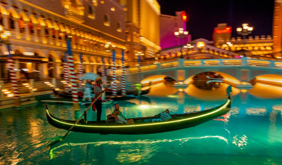 Tourists ride gondolas at The Venetian on Wednesday, April 24, 2019, in Las Vegas. (L.E. Baskow ...