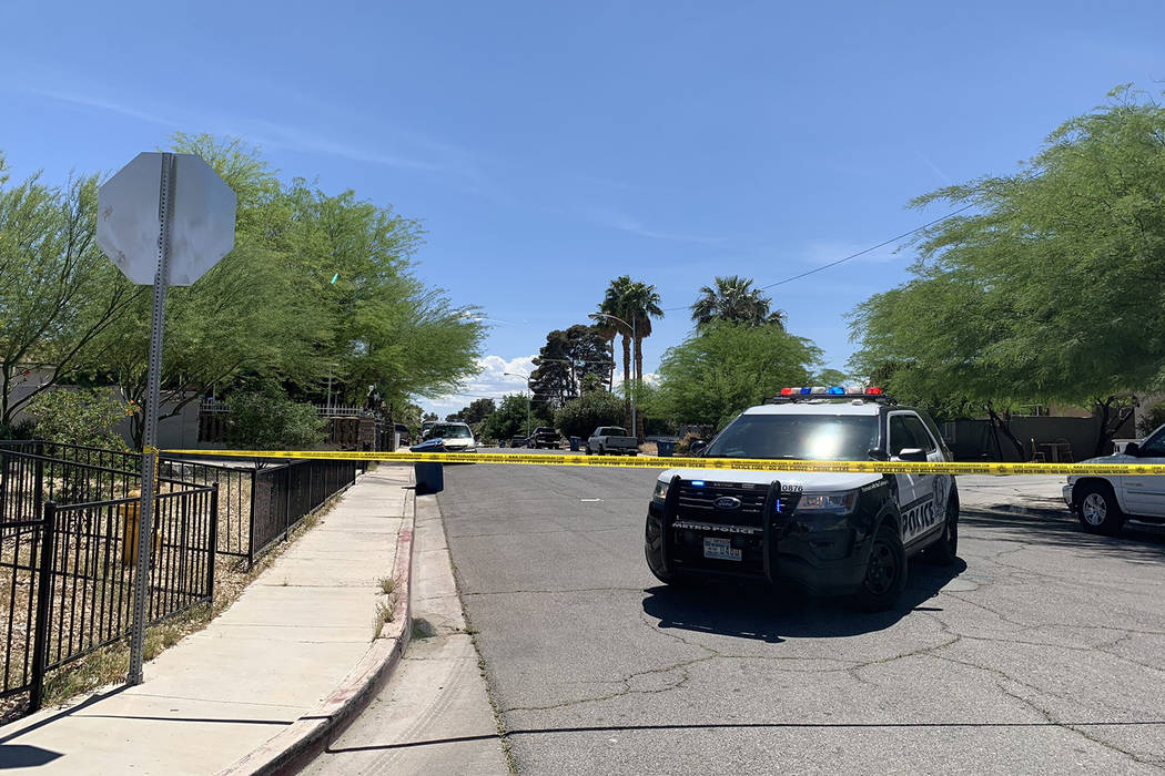 Las Vegas police and medical personnel respond to a shooting on the 3200 block of Silver Saddle ...