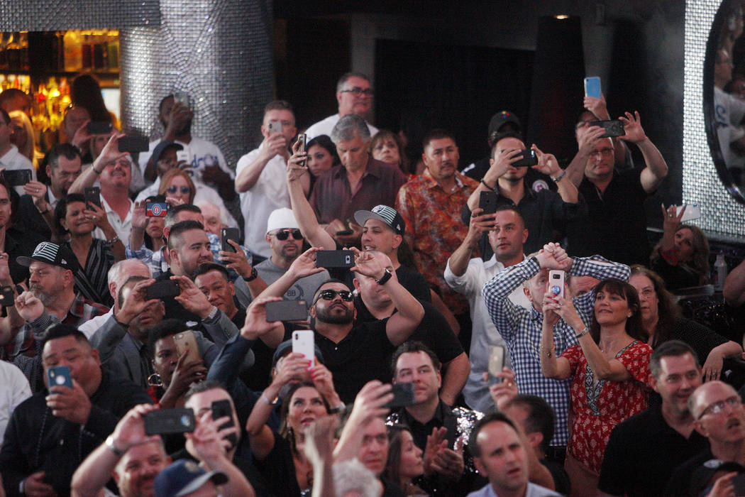 A crowd reacts to the fourth draft pick of Defensive End Clelin Ferrell at a Raiders draft part ...