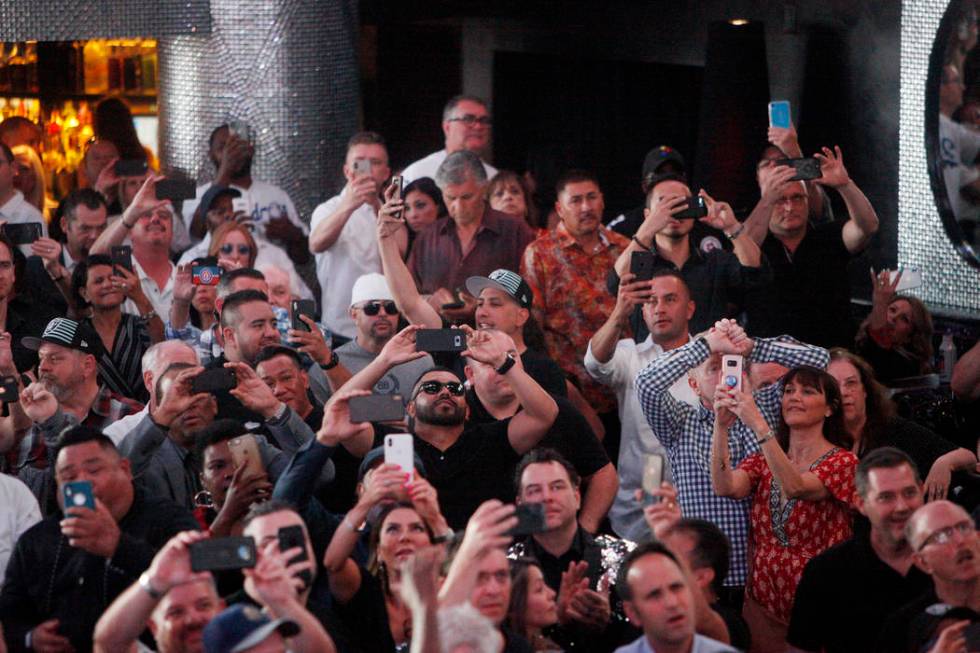 A crowd reacts to the fourth draft pick of Defensive End Clelin Ferrell at a Raiders draft part ...