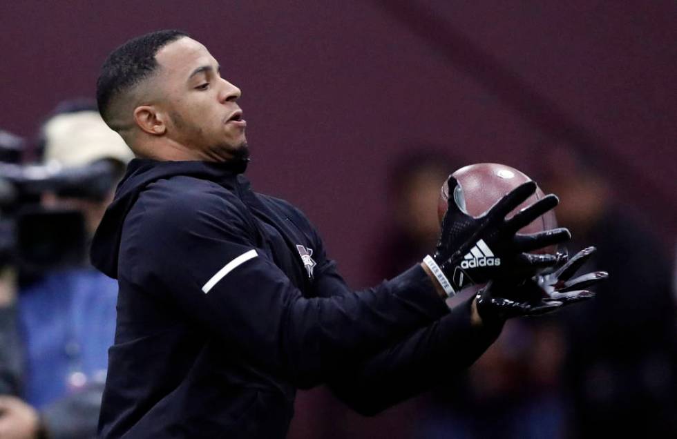 Former Mississippi State safety Johnathan Abram reaches for a pass during drills while getting ...