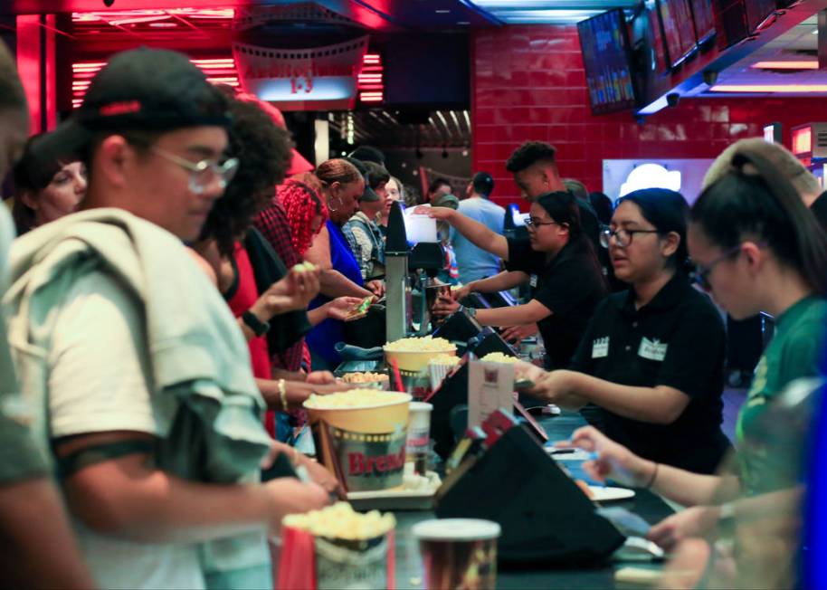 Moviegoers get their concession fix before first showing of "Avengers: Endgame" at Brenden Thea ...