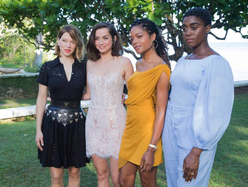 Actresses Lea Seydoux, from left, Ana de Armas, Naomie Harris and Lashana Lynch pose for photog ...