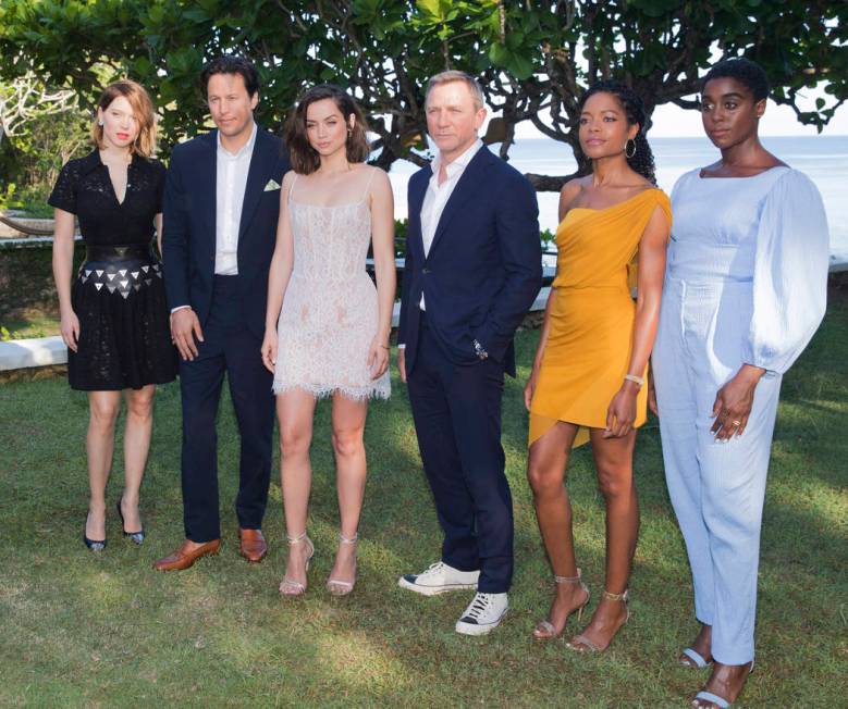 Actress Lea Seydoux, from left, director Cary Joji Fukunaga, actors Ana de Armas, Daniel Craig, ...