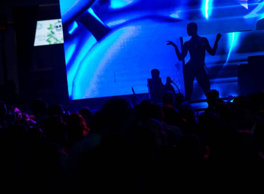 A dancer is silhouetted during the grand opening weekend of Kaos, the new dayclub and nightclub ...