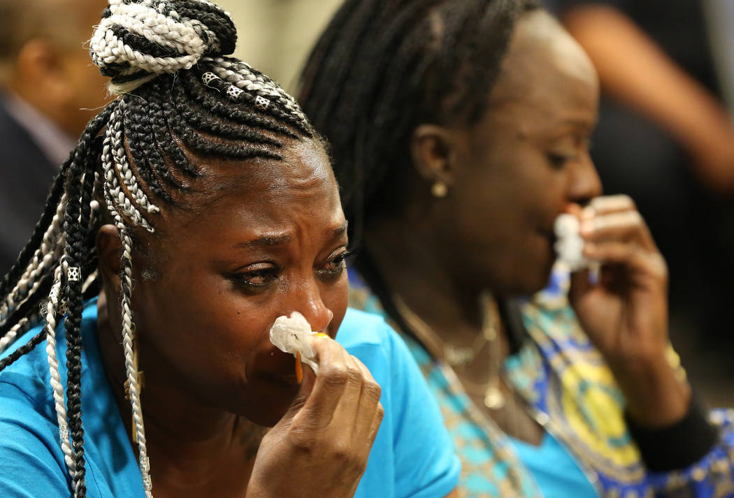 Akiko Cooks, left, weeps on Friday, April 26, 2019, during a sentencing hearing for a teen who ...