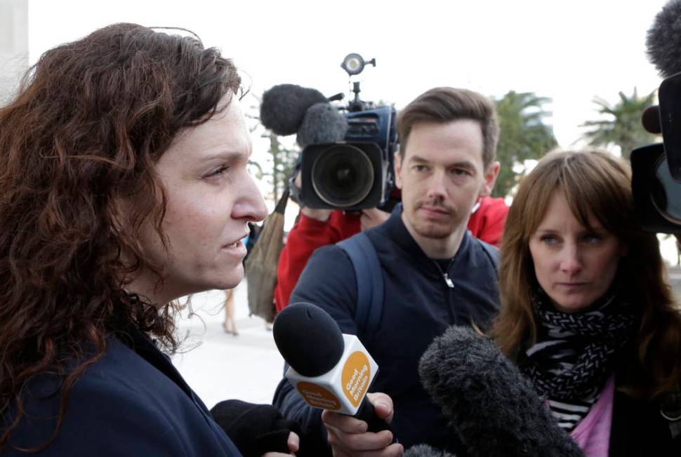 An assistant federal public defender Brenda Weksler addresses the media outside the Lloyd Georg ...