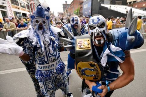 Indianapolis Colts fans pose for a photo during the 2019 NFL Draft Thursday, Apr. 25, 2019, in ...
