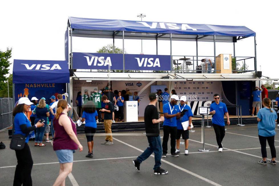 Fans attend the NFL Draft Experience, Thursday, April 25, 2019, in Nashville, Tenn. (AP Photo/A ...