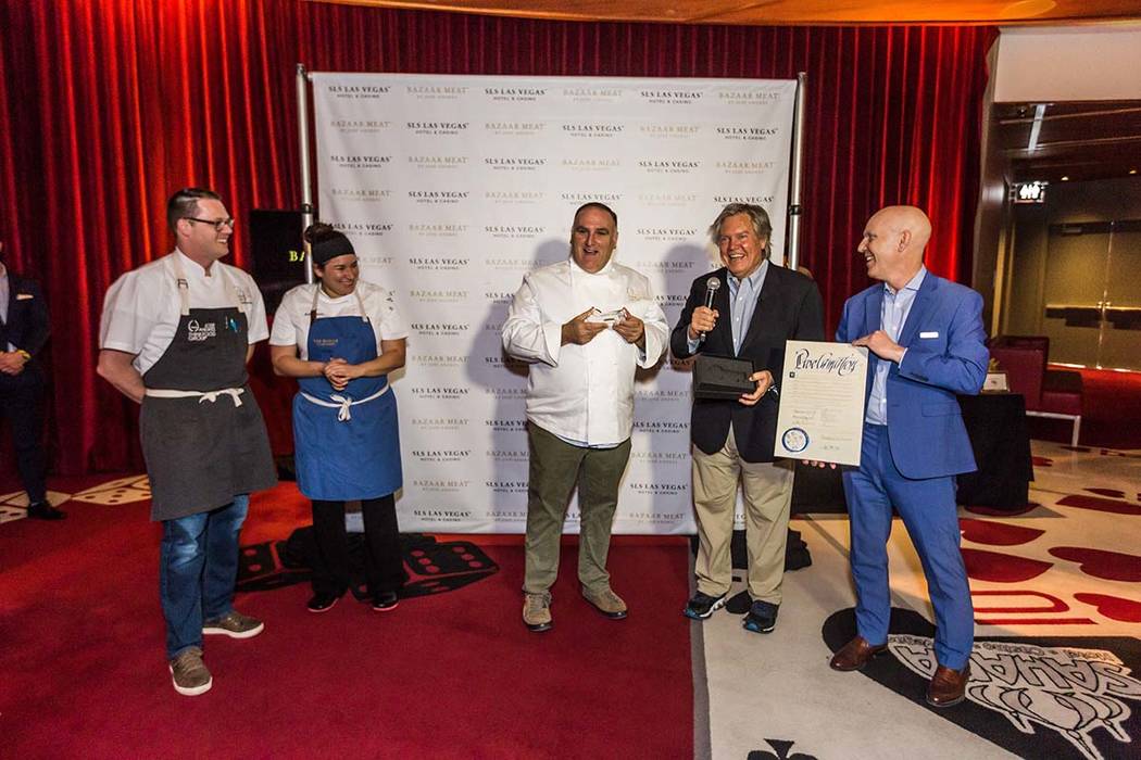 Jose Andres (center) receives a key to the Las Vegas Strip from Clark County Commissioner Tick ...