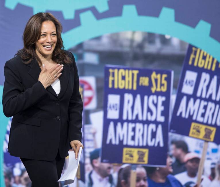 Presidential candidate Sen. Kamala Harris, D-Calif., walks on stage during ÒNational Forum ...