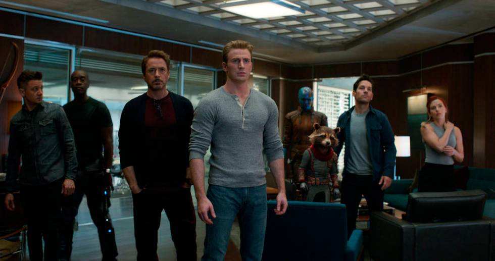 This image released by Disney shows, from left, Jeremy Renner, Don Cheadle, Robert Downey Jr., ...