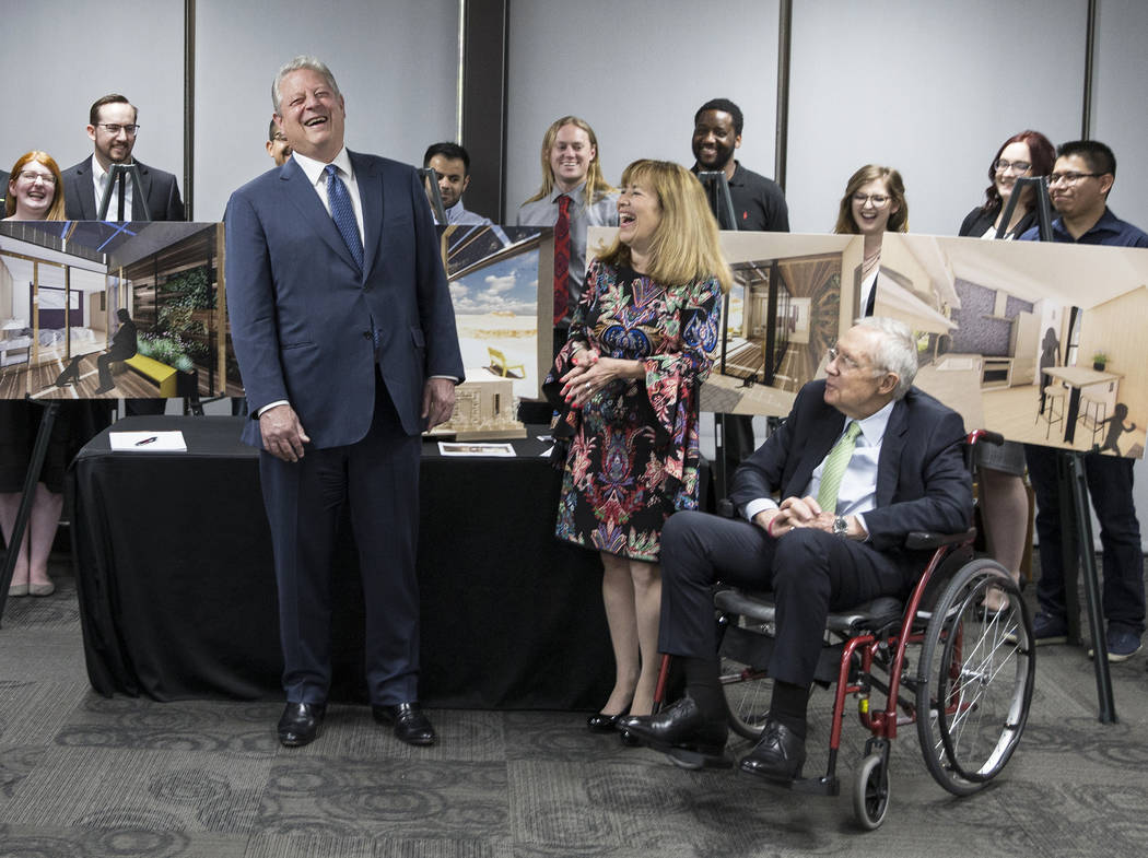 Former U.S. Vice President Al Gore, left, shares a laugh with UNLV President Marta Meana and fo ...