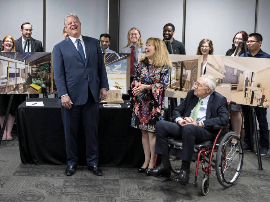 Former U.S. Vice President Al Gore, left, shares a laugh with UNLV President Marta Meana and fo ...