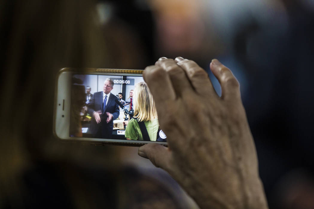 Former U.S. Vice President Al Gore, left, addresses the media after meeting with UNLV's solar d ...