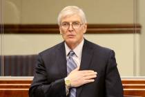 Assemblyman Skip Daly, D-Sparks, recites the Pledge of Allegiance during a floor session in the ...