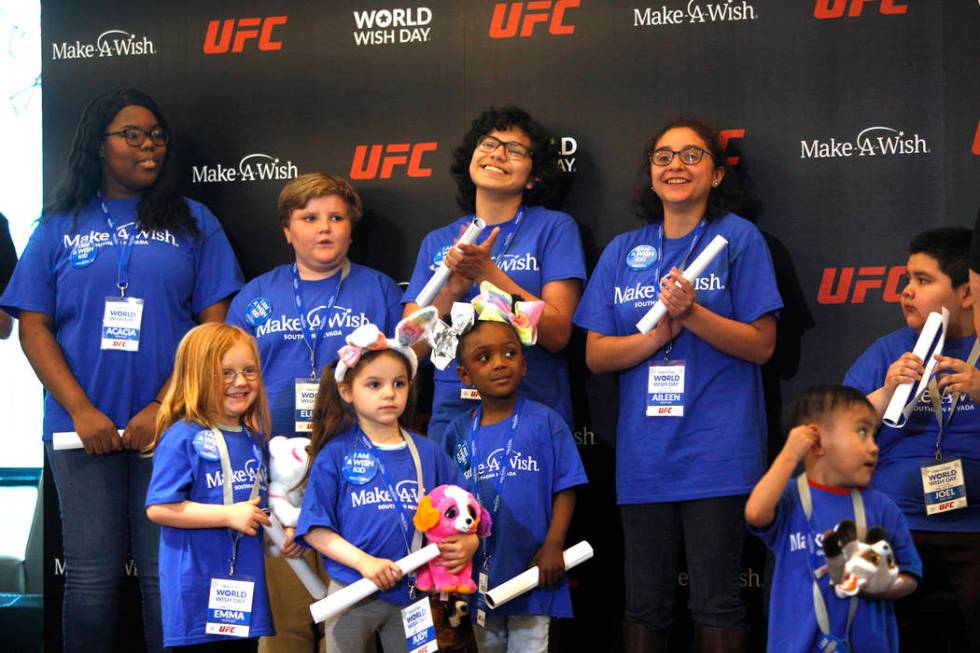 Children react as their wishes are granted by Make-A-Wish in partnership with UFC at the UFC co ...