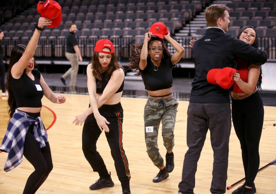 Members of the WNBA Las Vegas Aces Wild Card Crew, from left, Ciera Evans, 19, of Henderson, Sk ...