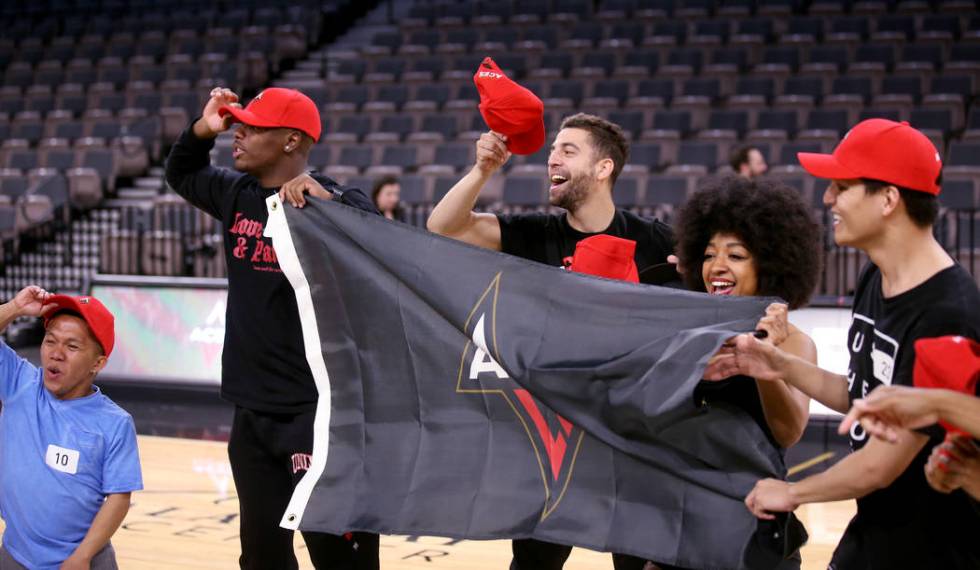 Members of the WNBA Las Vegas Aces Wild Card Crew, from left, Jordan Cline, 34, of Las Vegas, J ...