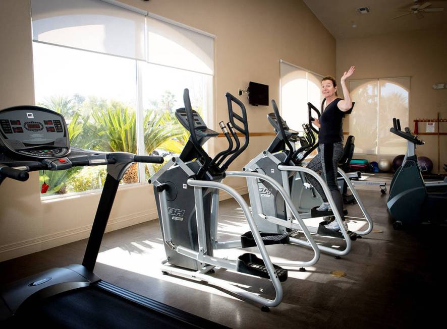 A Las Vegas Motorcoach Resort community member waves during a workout. (Tonya Harvey Real Estat ...