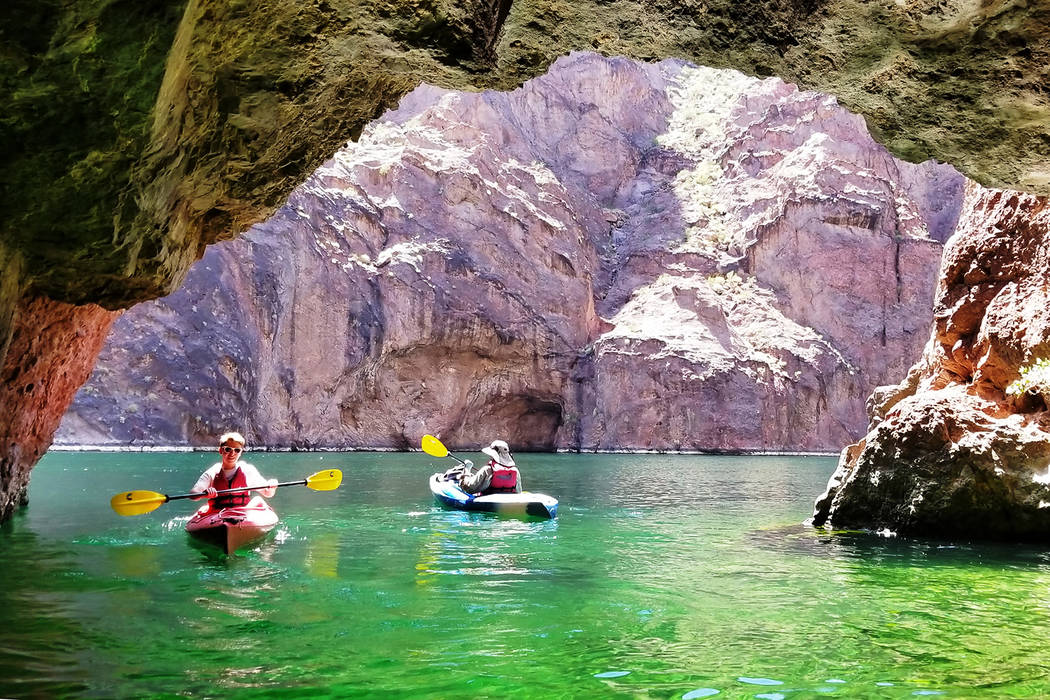 Ryan Burt and Chris Burt kayak at the famed Emerald Cave. (Natalie Burt)