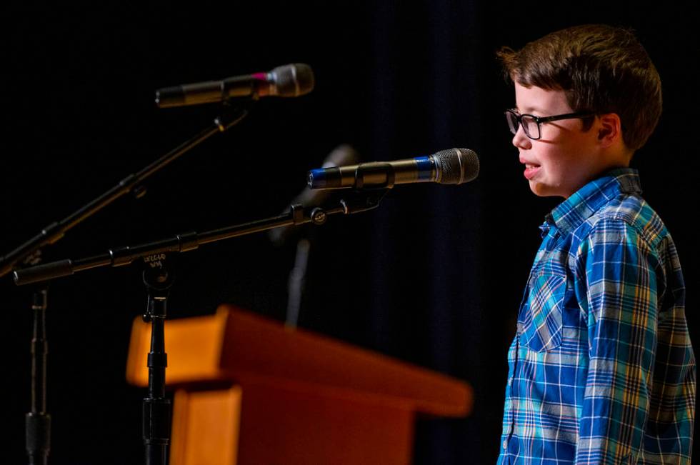 Forbuss Elementary School student Reed Hambly performs "Purple, Green and Yellow" dur ...