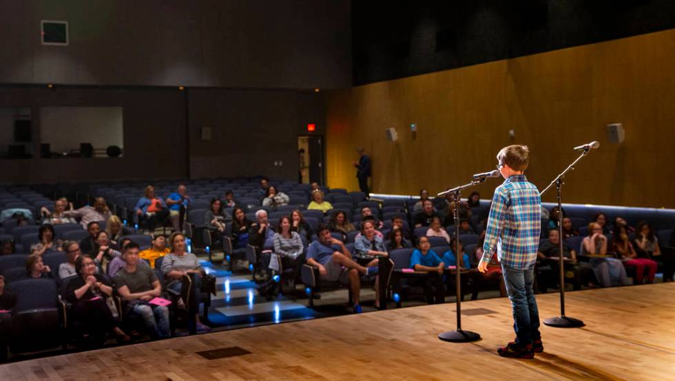 Forbuss Elementary School student Reed Hambly performs "Purple, Green and Yellow" dur ...