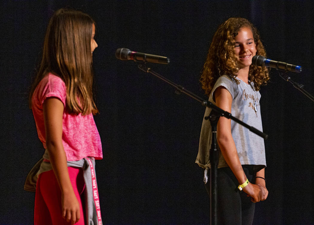 Goolsby Elementary School students Vanesa Stamatova and Natalie Fontes perform "My New Fri ...