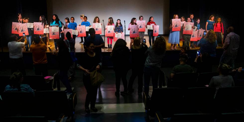 CCSD elementary school students gather on stage after reciting their stories during the Bristle ...