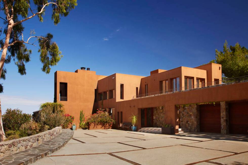 Bold and intense color choices can really enhance the drama and visual of a desert modern home. ...