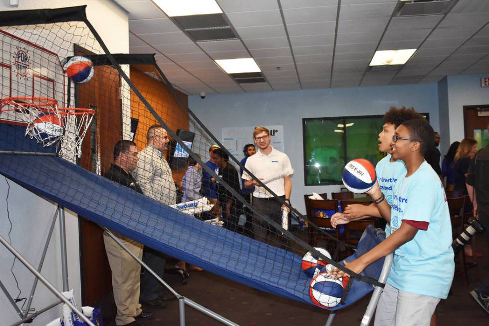 Teens play basketball in their renovated Teen Center on Wednesday, April 24. Rachel Spacek/Las ...