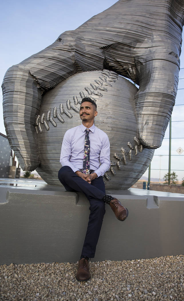 Artist Luis Varela-Rico with his sculpture "Organic Study No. 2" during a dedication ...