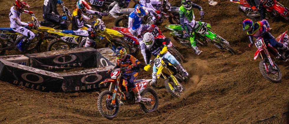 Red plate points leader Cooper Webb (2) leads the pack during the featured 450 SX class race at ...