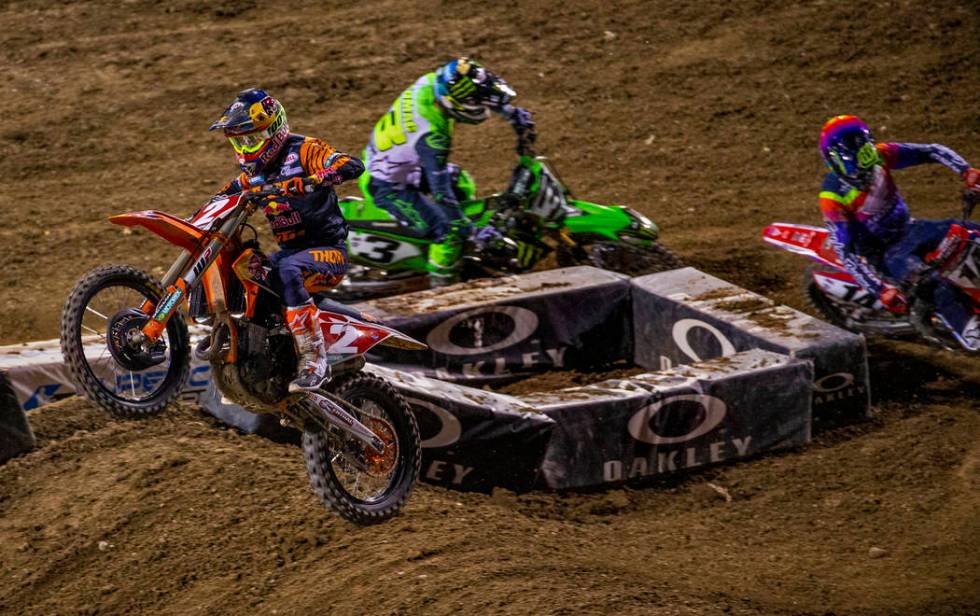 Red plate points leader Cooper Webb (2) leads the pack during the featured 450 SX class race at ...