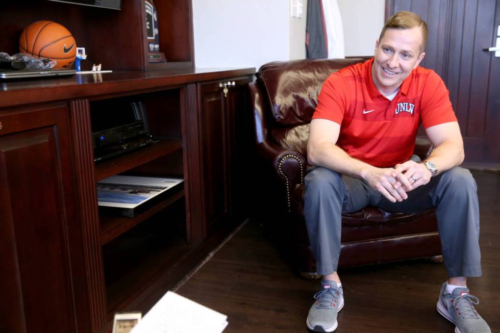 New UNLV basketball coach T.J. Otzelberger talks to a reporter in his office at the Thomas &amp ...