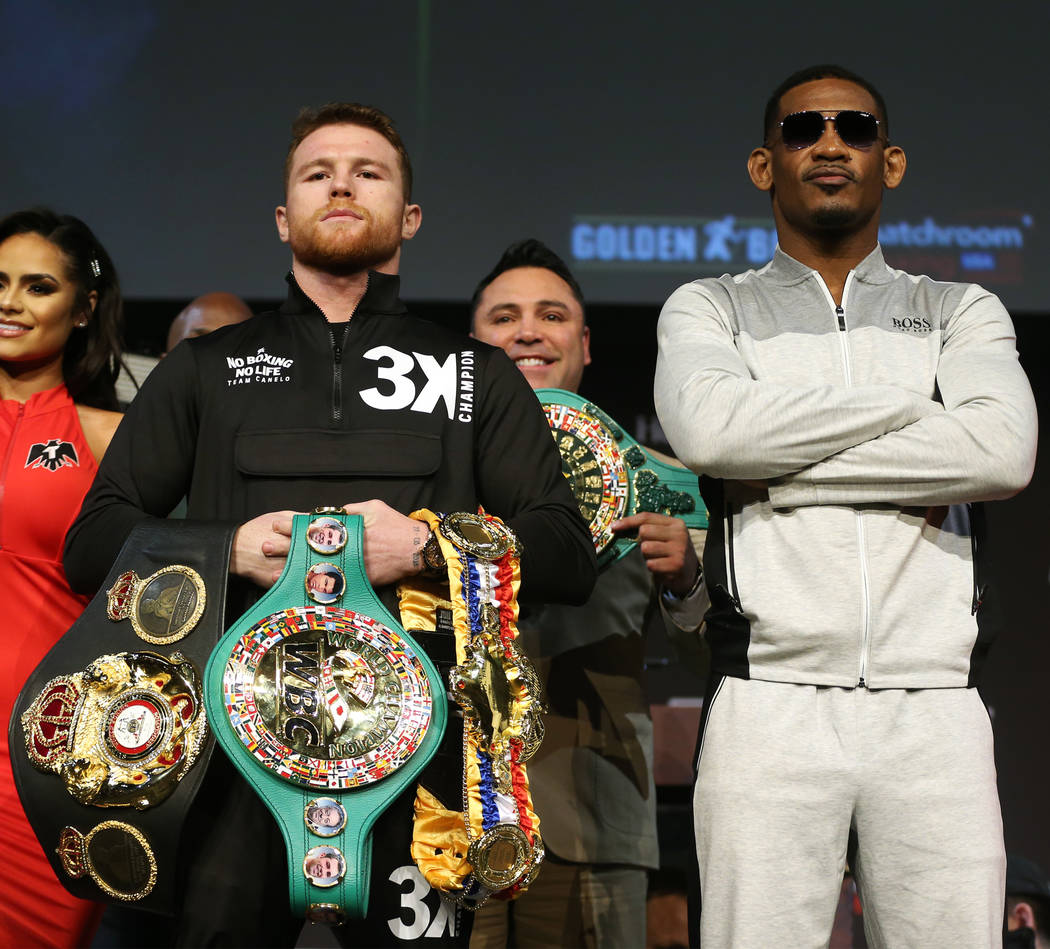 Saul "Canelo" Alvarez, left, and Daniel Jacobs, pose during a press conference at the ...