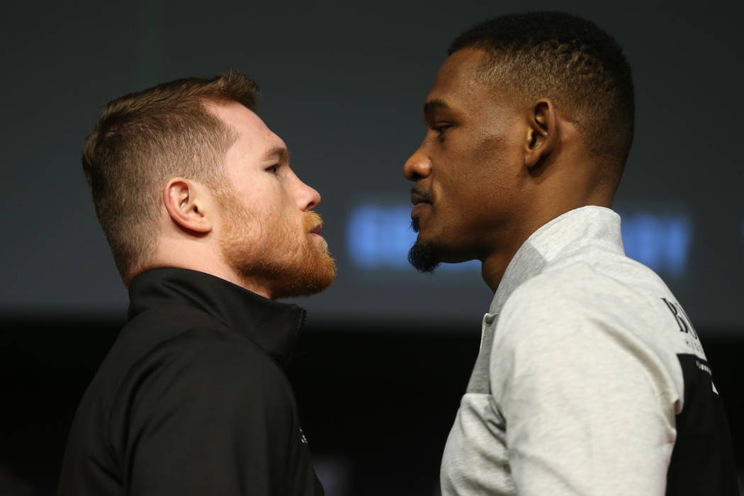 Saul "Canelo" Alvarez, left, and Daniel Jacobs, pose during a press conference at the ...