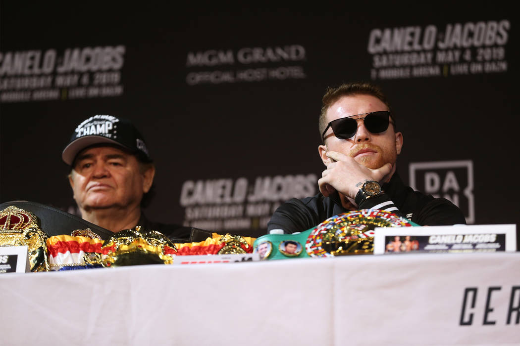 Saul "Canelo" Alvarez, right, with his trainer Jose "Chepo" Reynoso, during ...